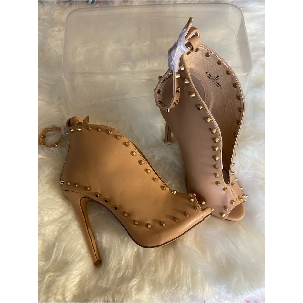 Tan heel booties with ankle strap & gold studs. Available in sizes 7 and 7 1/2.